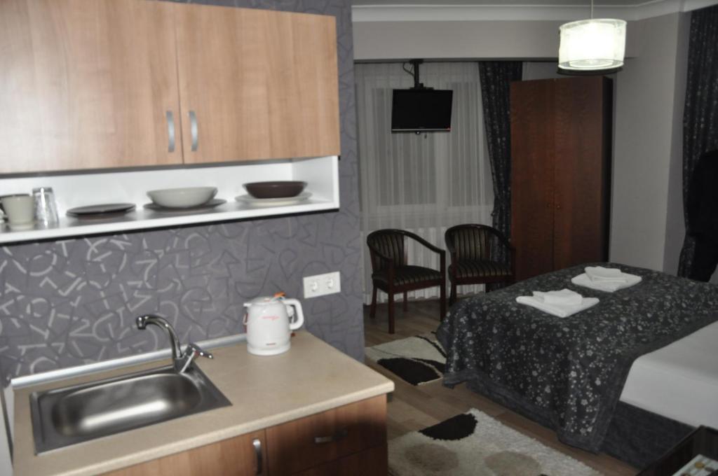 Kare Suite Nisantasi Стамбул Номер фото